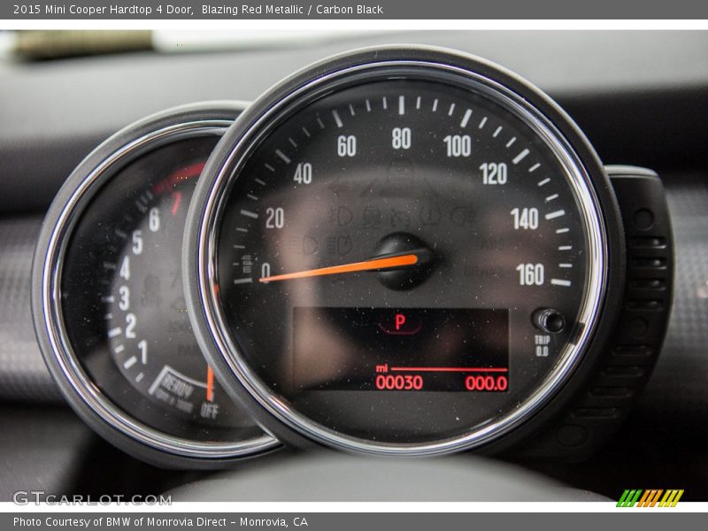 Blazing Red Metallic / Carbon Black 2015 Mini Cooper Hardtop 4 Door