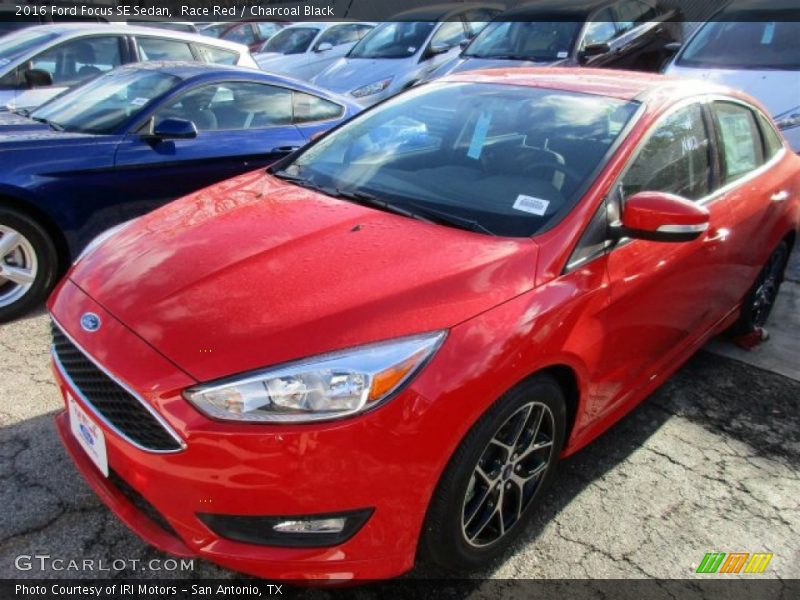 Race Red / Charcoal Black 2016 Ford Focus SE Sedan