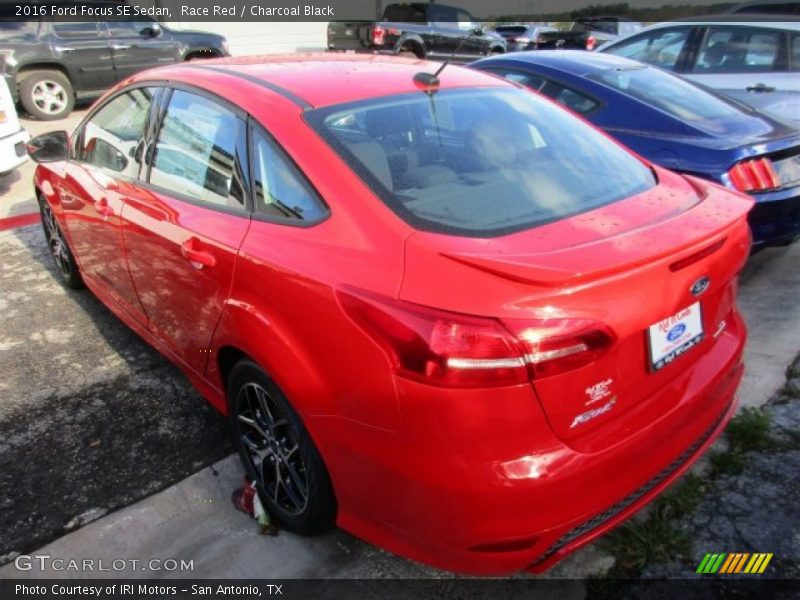Race Red / Charcoal Black 2016 Ford Focus SE Sedan