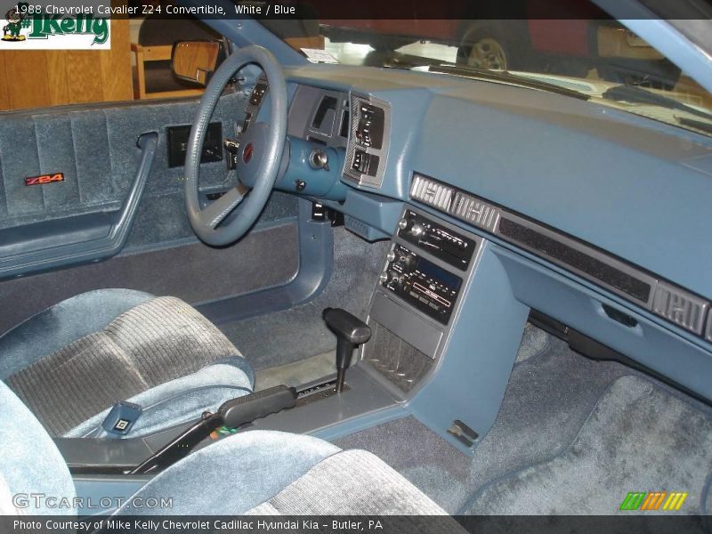 White / Blue 1988 Chevrolet Cavalier Z24 Convertible
