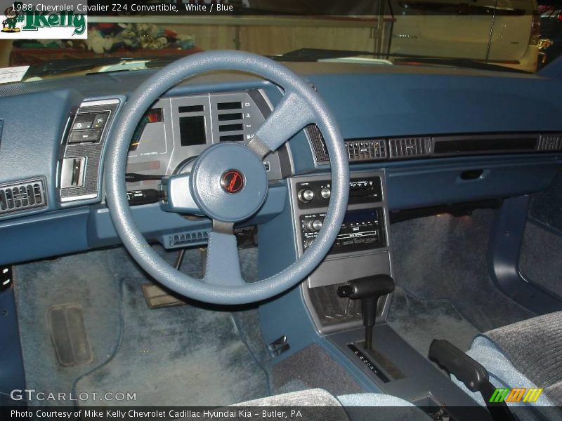 White / Blue 1988 Chevrolet Cavalier Z24 Convertible