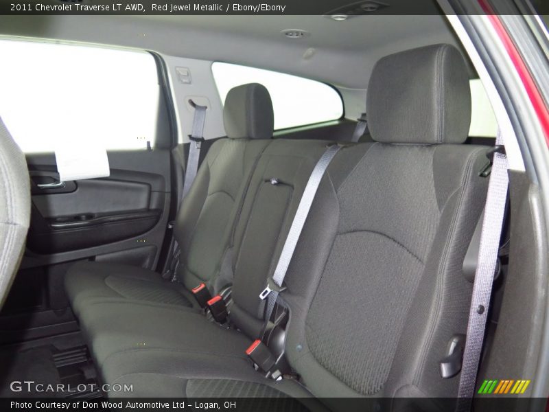 Red Jewel Metallic / Ebony/Ebony 2011 Chevrolet Traverse LT AWD
