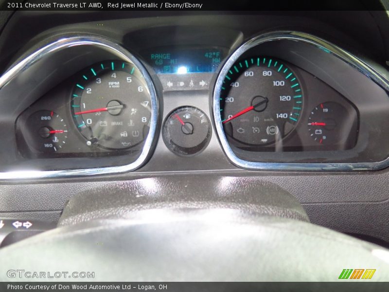Red Jewel Metallic / Ebony/Ebony 2011 Chevrolet Traverse LT AWD