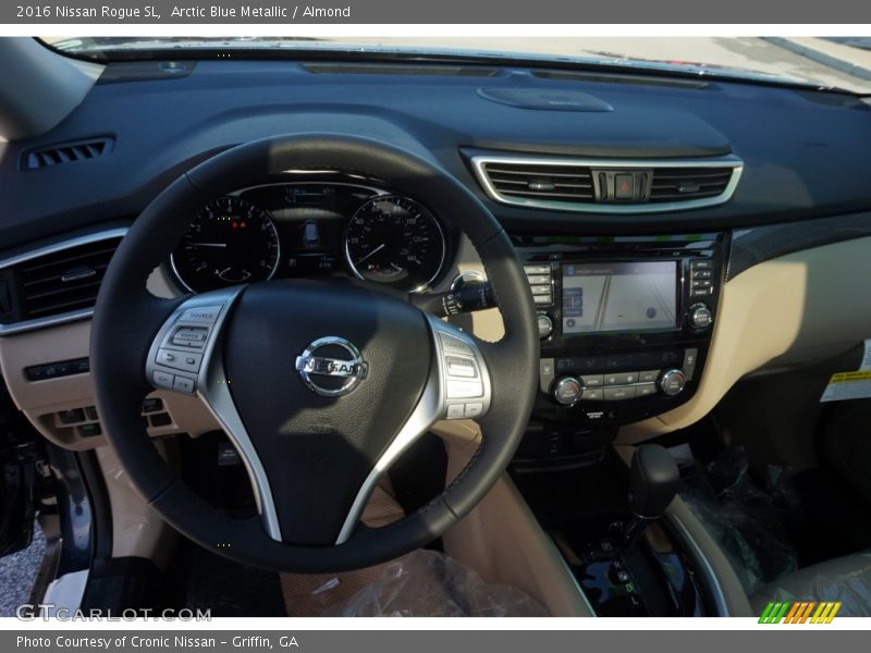 Arctic Blue Metallic / Almond 2016 Nissan Rogue SL