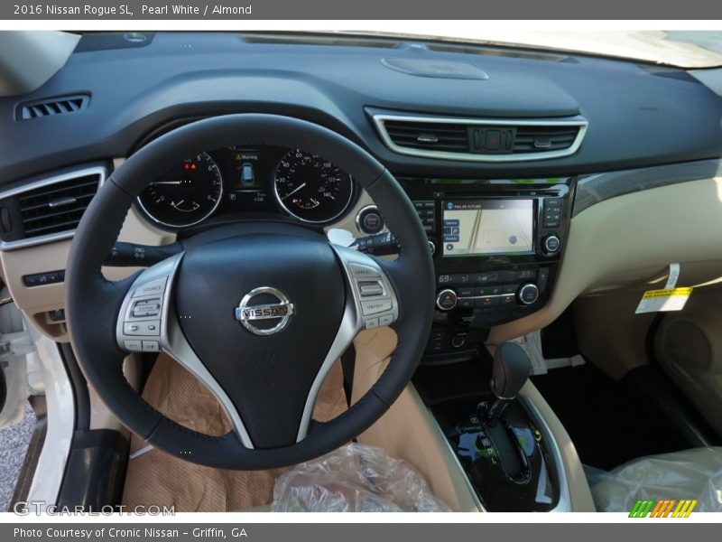 Pearl White / Almond 2016 Nissan Rogue SL