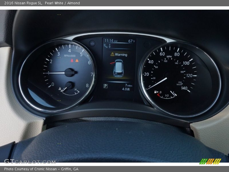 Pearl White / Almond 2016 Nissan Rogue SL