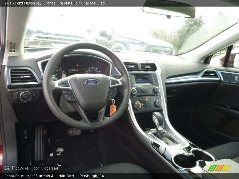 Bronze Fire Metallic / Charcoal Black 2016 Ford Fusion SE