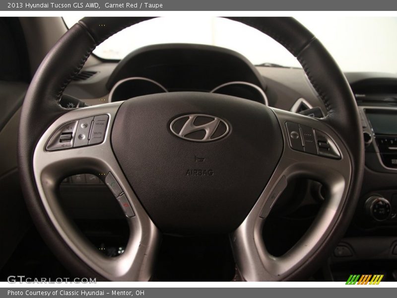 Garnet Red / Taupe 2013 Hyundai Tucson GLS AWD