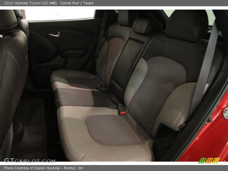 Garnet Red / Taupe 2013 Hyundai Tucson GLS AWD