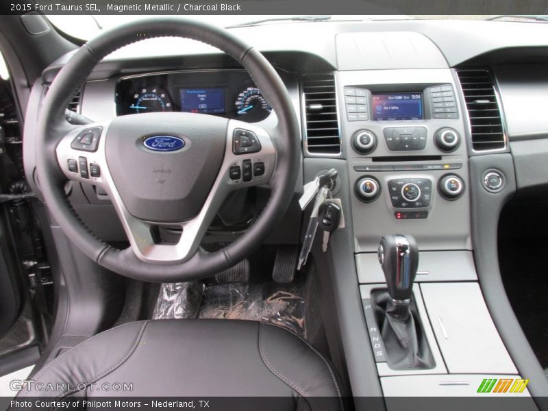 Magnetic Metallic / Charcoal Black 2015 Ford Taurus SEL