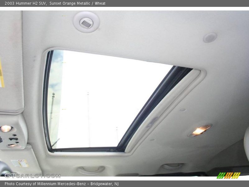 Sunset Orange Metallic / Wheat 2003 Hummer H2 SUV