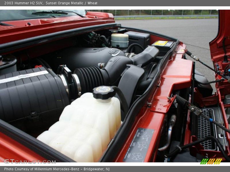 Sunset Orange Metallic / Wheat 2003 Hummer H2 SUV