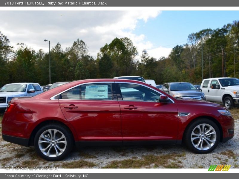 Ruby Red Metallic / Charcoal Black 2013 Ford Taurus SEL