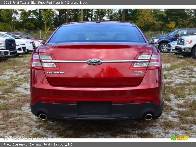 Ruby Red Metallic / Charcoal Black 2013 Ford Taurus SEL