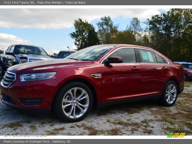 Ruby Red Metallic / Charcoal Black 2013 Ford Taurus SEL