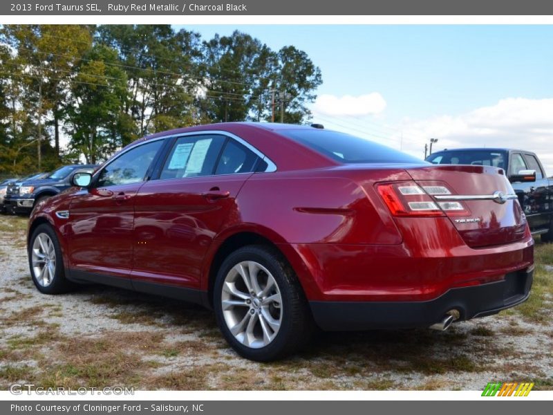 Ruby Red Metallic / Charcoal Black 2013 Ford Taurus SEL