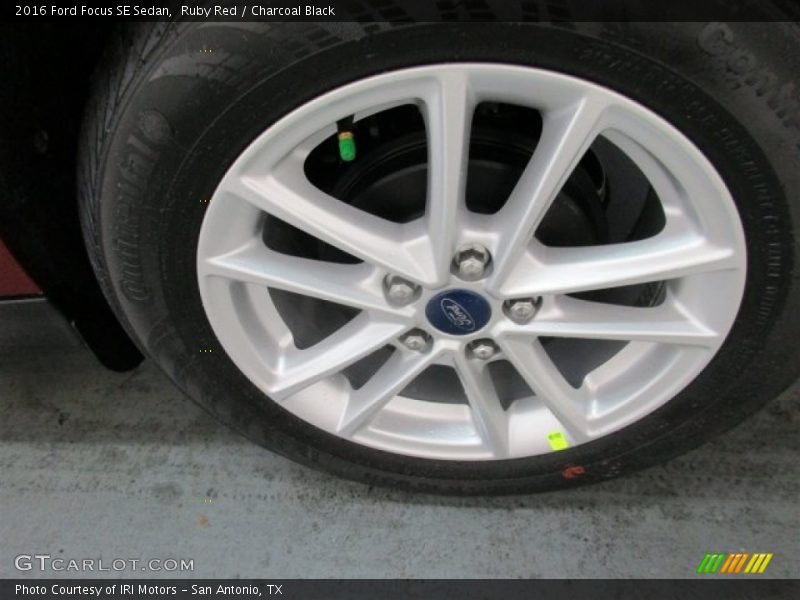 Ruby Red / Charcoal Black 2016 Ford Focus SE Sedan