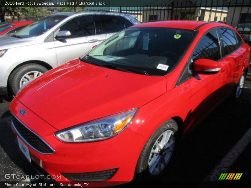 Race Red / Charcoal Black 2016 Ford Focus SE Sedan