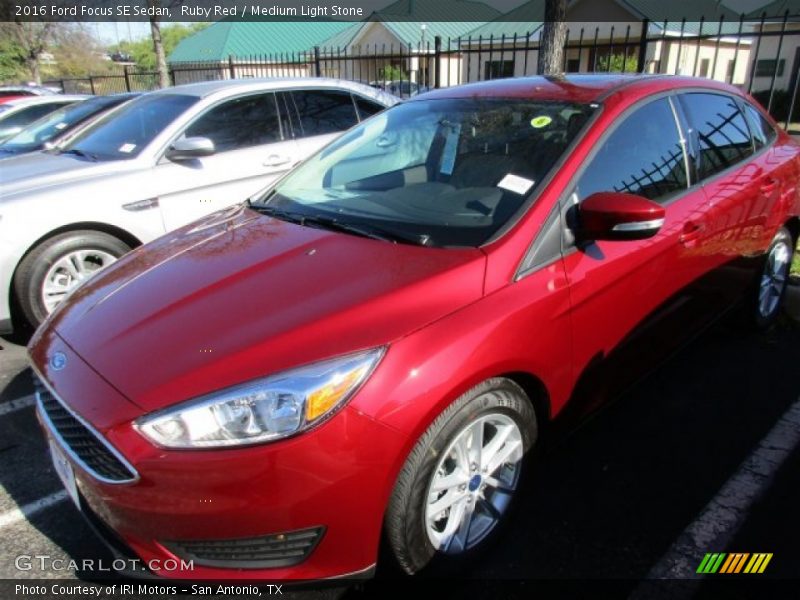 Ruby Red / Medium Light Stone 2016 Ford Focus SE Sedan