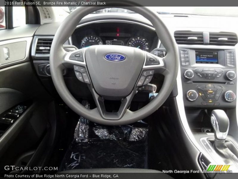 Bronze Fire Metallic / Charcoal Black 2016 Ford Fusion SE
