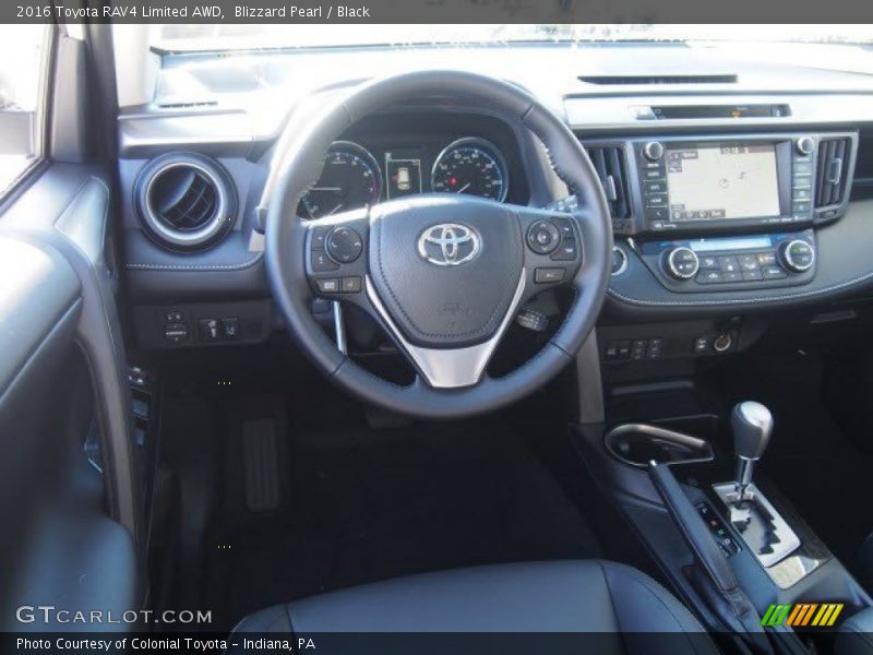 Blizzard Pearl / Black 2016 Toyota RAV4 Limited AWD