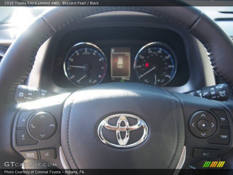 Blizzard Pearl / Black 2016 Toyota RAV4 Limited AWD