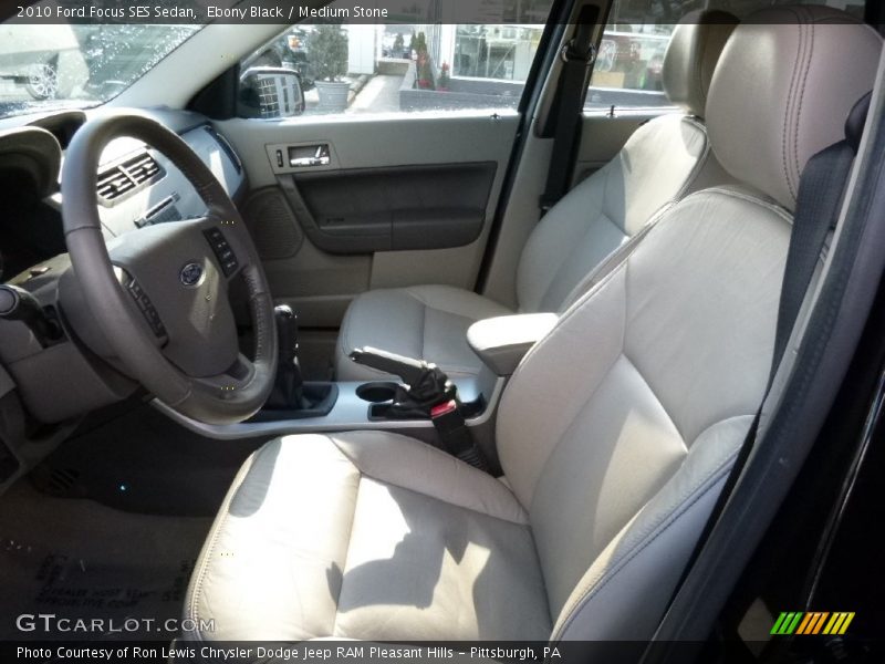 Ebony Black / Medium Stone 2010 Ford Focus SES Sedan
