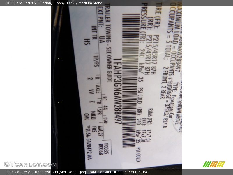 Ebony Black / Medium Stone 2010 Ford Focus SES Sedan