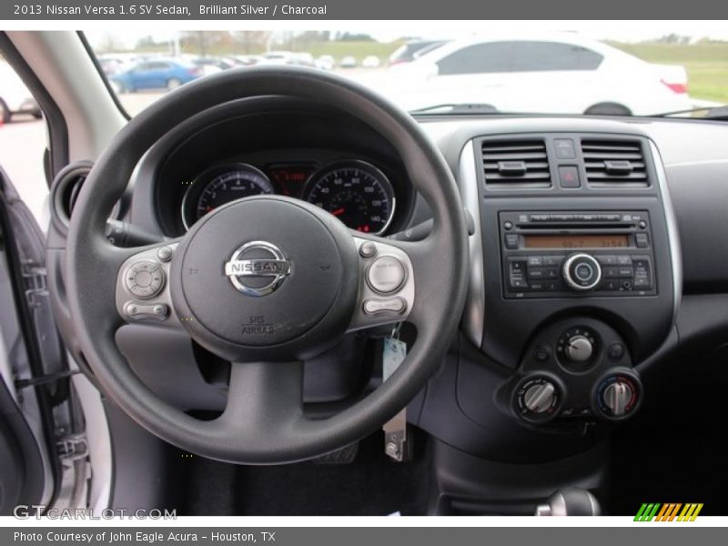Brilliant Silver / Charcoal 2013 Nissan Versa 1.6 SV Sedan