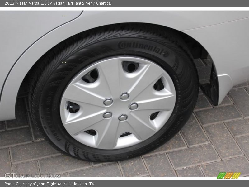 Brilliant Silver / Charcoal 2013 Nissan Versa 1.6 SV Sedan