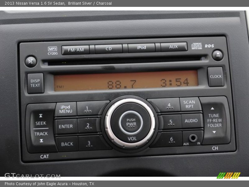 Brilliant Silver / Charcoal 2013 Nissan Versa 1.6 SV Sedan