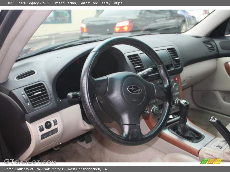 Garnet Red Pearl / Taupe 2005 Subaru Legacy 2.5 GT Limited Sedan