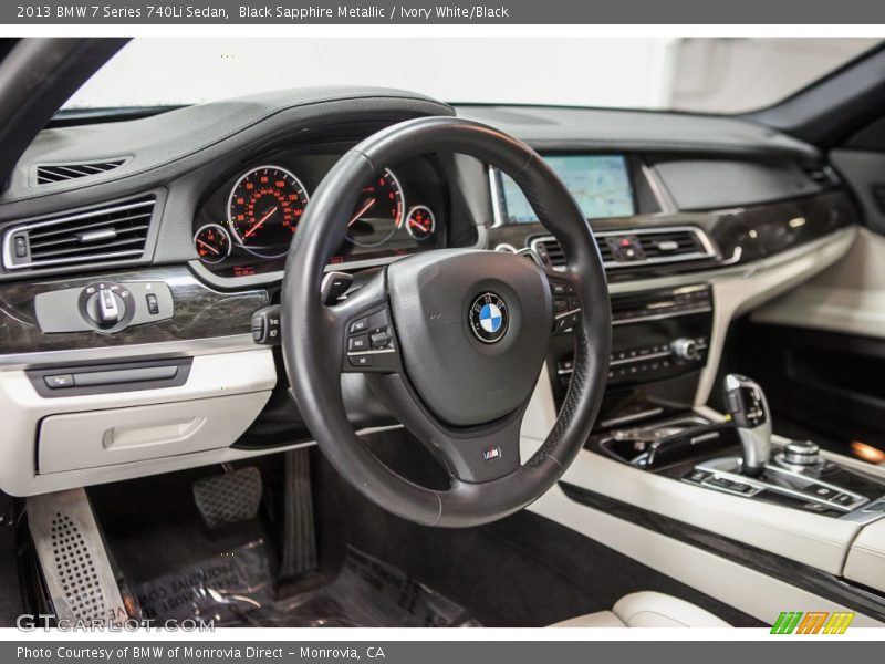 Black Sapphire Metallic / Ivory White/Black 2013 BMW 7 Series 740Li Sedan