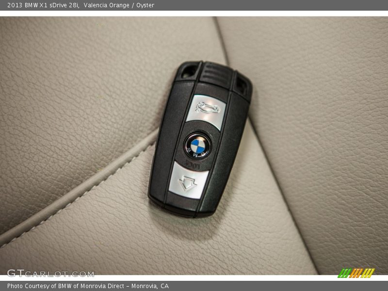 Valencia Orange / Oyster 2013 BMW X1 sDrive 28i