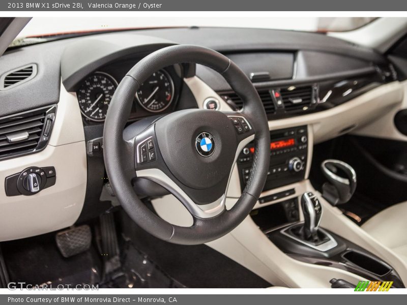 Valencia Orange / Oyster 2013 BMW X1 sDrive 28i