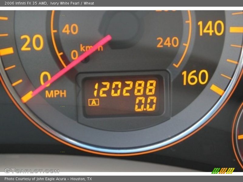 Ivory White Pearl / Wheat 2006 Infiniti FX 35 AWD