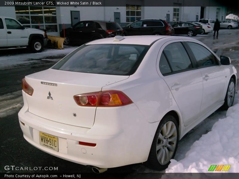 Wicked White Satin / Black 2009 Mitsubishi Lancer GTS