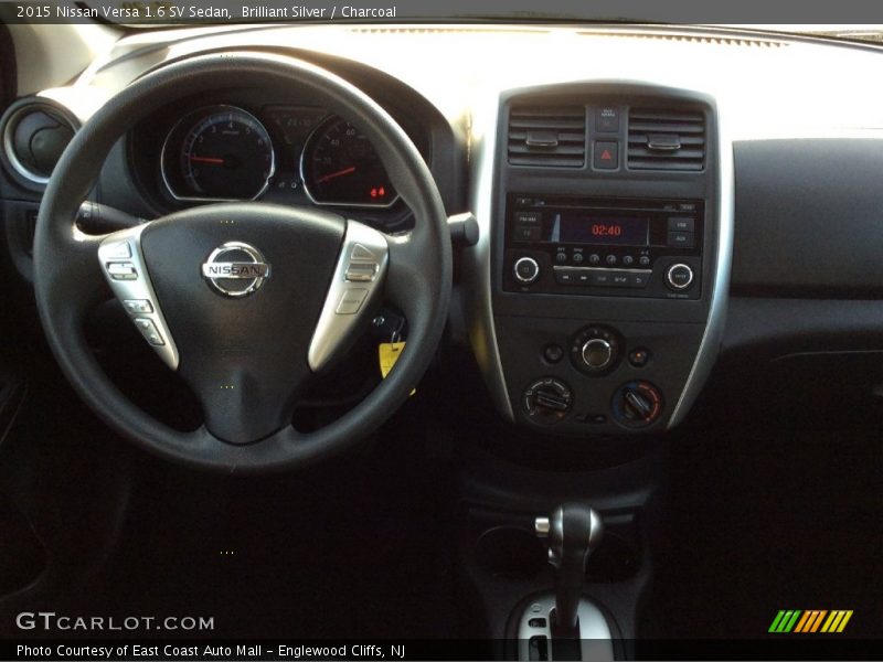 Brilliant Silver / Charcoal 2015 Nissan Versa 1.6 SV Sedan