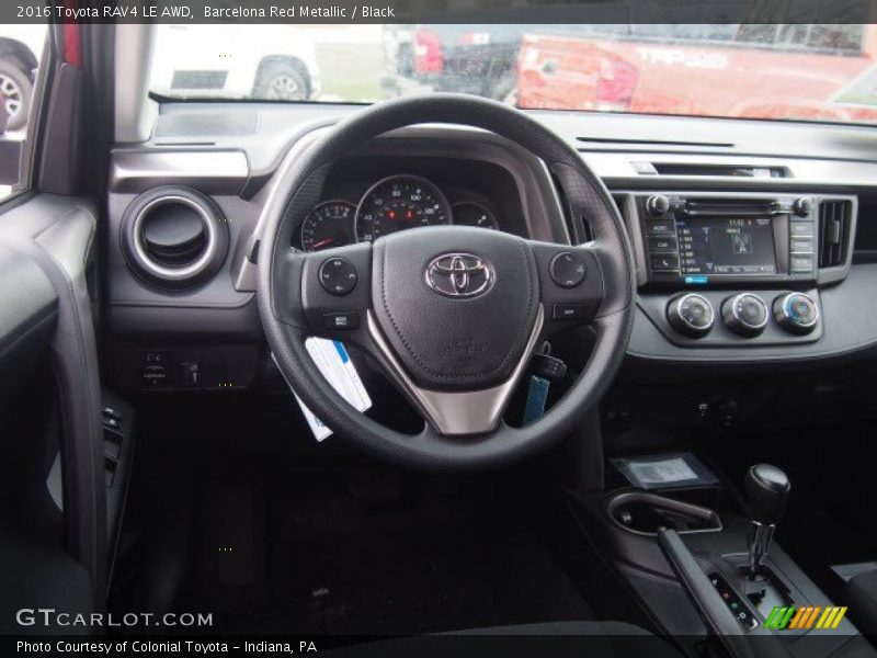 Barcelona Red Metallic / Black 2016 Toyota RAV4 LE AWD