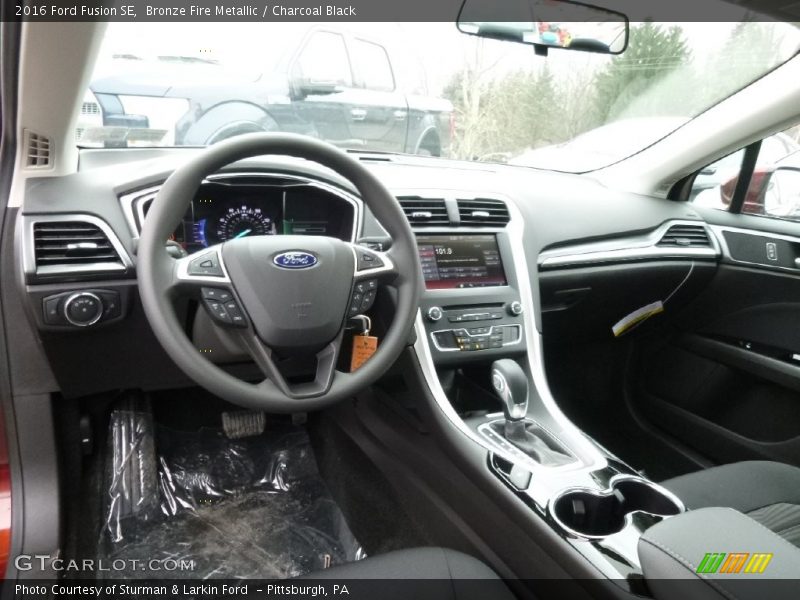 Bronze Fire Metallic / Charcoal Black 2016 Ford Fusion SE