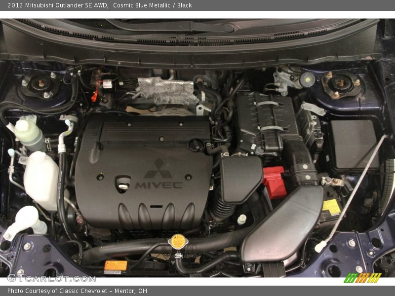 Cosmic Blue Metallic / Black 2012 Mitsubishi Outlander SE AWD