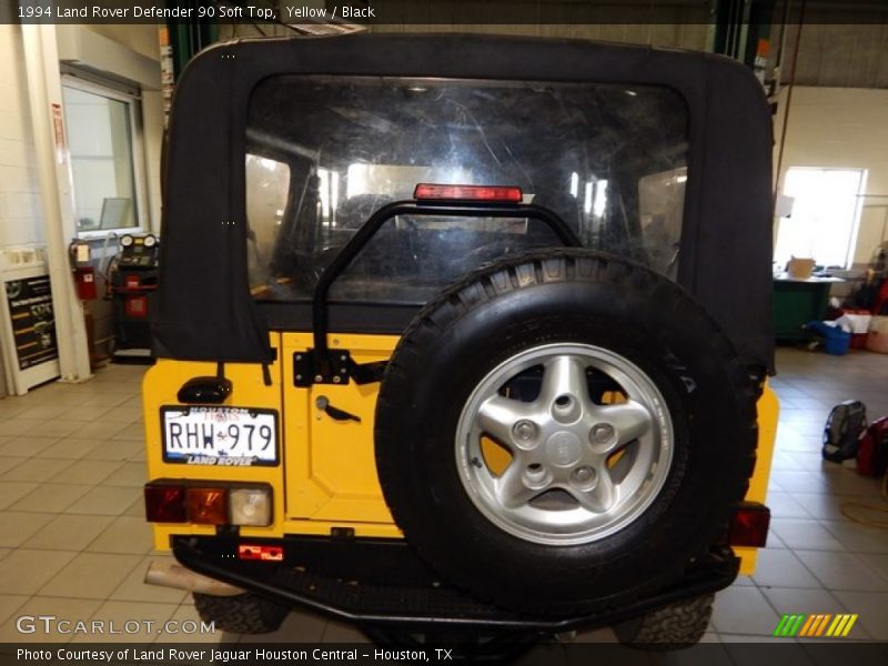 Yellow / Black 1994 Land Rover Defender 90 Soft Top