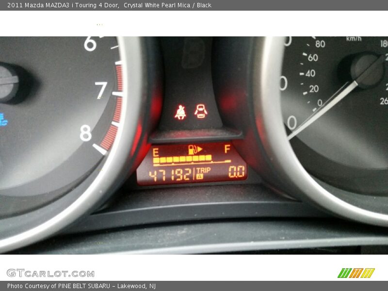 Crystal White Pearl Mica / Black 2011 Mazda MAZDA3 i Touring 4 Door