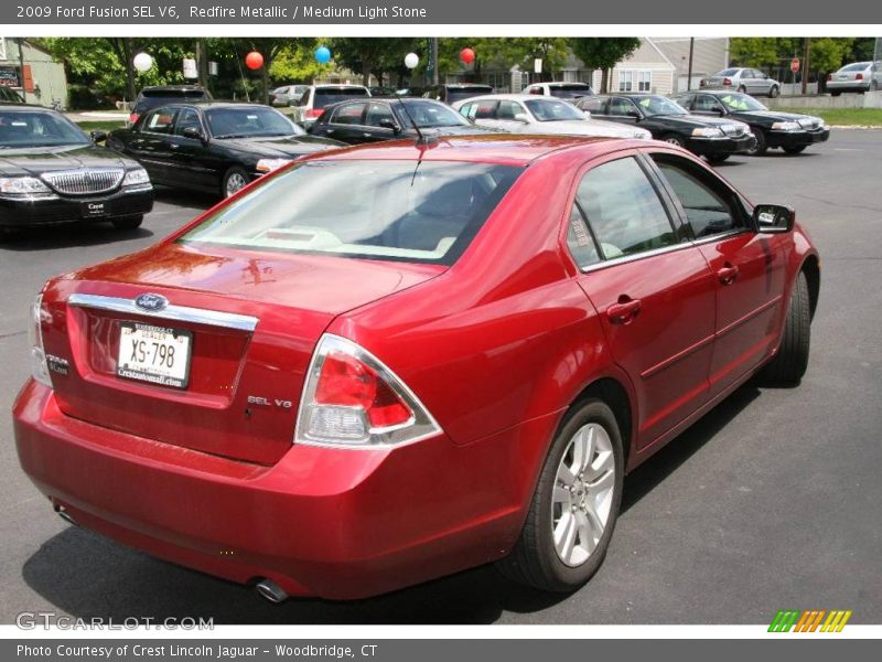 Redfire Metallic / Medium Light Stone 2009 Ford Fusion SEL V6