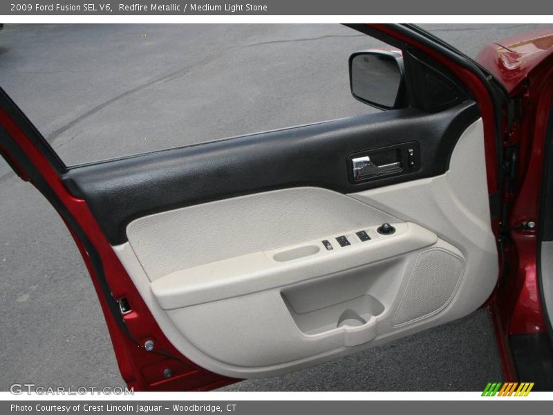 Redfire Metallic / Medium Light Stone 2009 Ford Fusion SEL V6