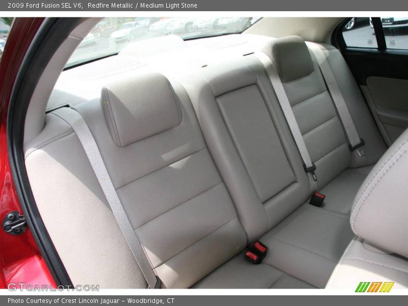Redfire Metallic / Medium Light Stone 2009 Ford Fusion SEL V6
