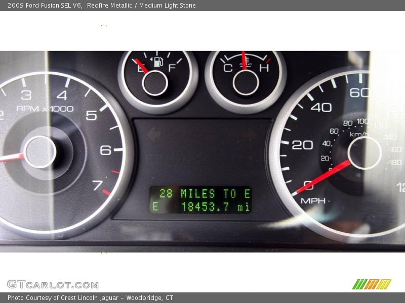Redfire Metallic / Medium Light Stone 2009 Ford Fusion SEL V6