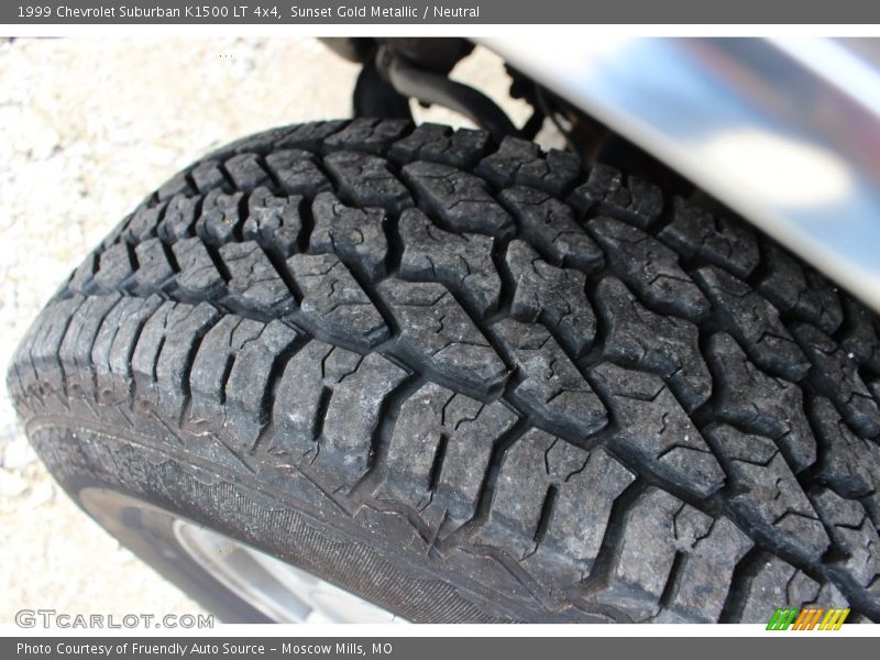 Sunset Gold Metallic / Neutral 1999 Chevrolet Suburban K1500 LT 4x4