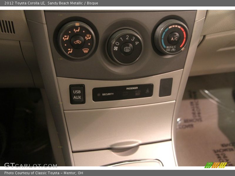 Sandy Beach Metallic / Bisque 2012 Toyota Corolla LE