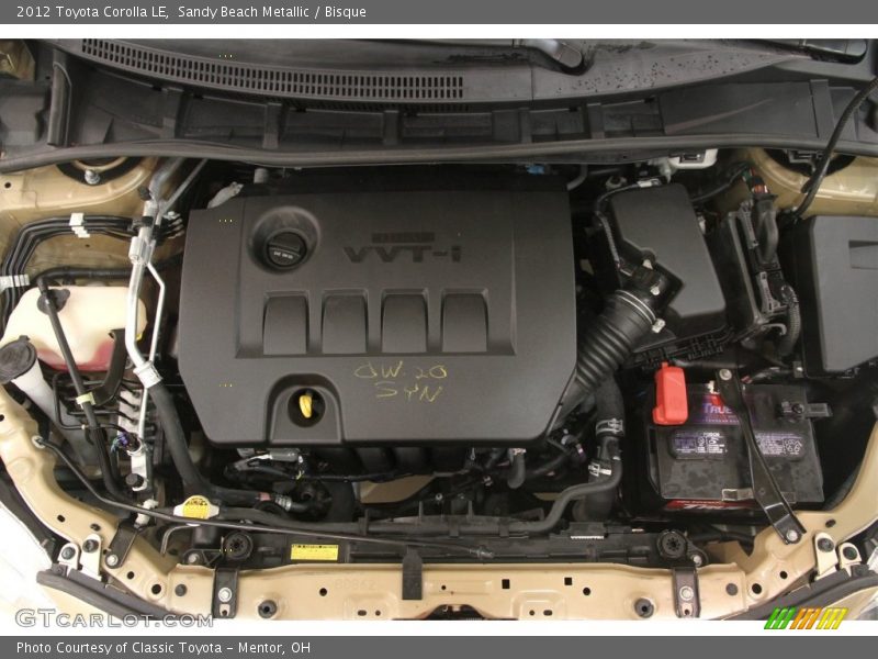 Sandy Beach Metallic / Bisque 2012 Toyota Corolla LE